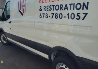 Decals for Lanier Custom Homes & Restoration work van left side from top to bottom